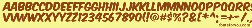 Komikax Font – Brown Fonts on Yellow Background