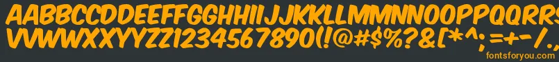 Komikax Font – Orange Fonts on Black Background