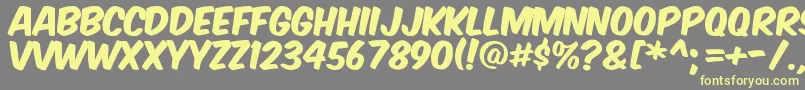 フォントKomikax – 黄色のフォント、灰色の背景