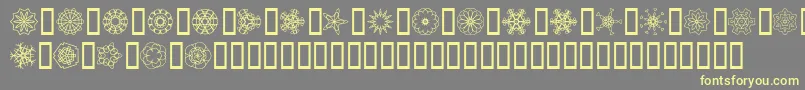 JiKaleidoscopeBats Font – Yellow Fonts on Gray Background