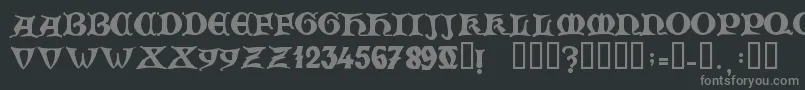 フォントZamolxisV – 黒い背景に灰色の文字