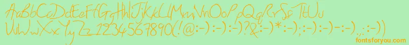 フォントHoneyIStoleYourJumper – オレンジの文字が緑の背景にあります。