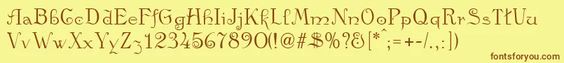 Kamelia Font – Brown Fonts on Yellow Background