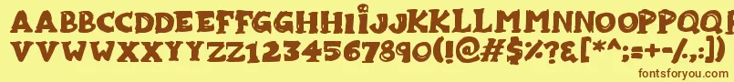 Zombiebites Font – Brown Fonts on Yellow Background