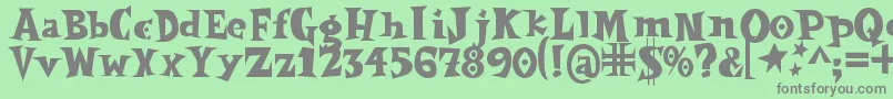 Spookymagic Font – Gray Fonts on Green Background