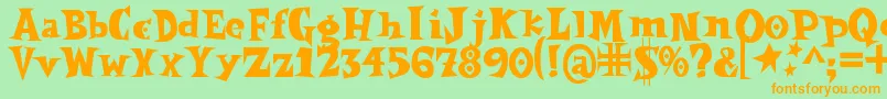 Spookymagic Font – Orange Fonts on Green Background