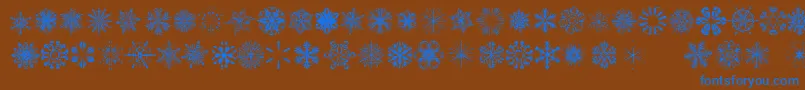 Czcionka SnowflakesTfb – niebieskie czcionki na brązowym tle
