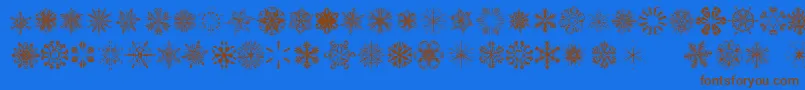 Weitere Informationen zur SnowflakesTfb-Schriftart SnowflakesTfb-Schriftart – Braune Schriften auf blauem Hintergrund