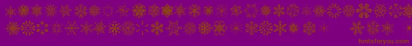 Шрифт SnowflakesTfb – коричневые шрифты на фиолетовом фоне