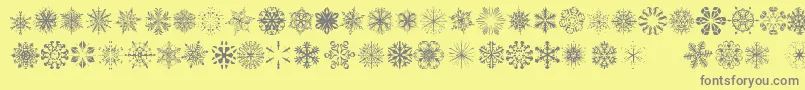 More about SnowflakesTfb Font SnowflakesTfb Font – Gray Fonts on Yellow Background