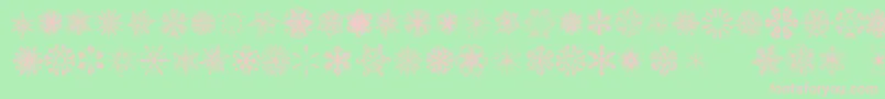 SnowflakesTfb-fontti – vaaleanpunaiset fontit vihreällä taustalla