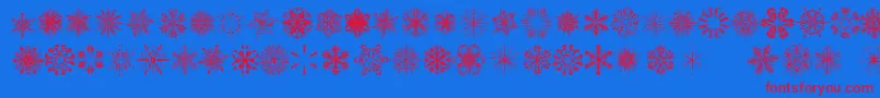 Więcej informacji o czcionce SnowflakesTfb Czcionka SnowflakesTfb – czerwone czcionki na niebieskim tle