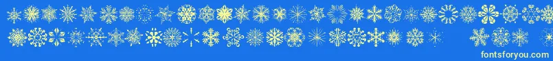 SnowflakesTfb-Schriftart – Gelbe Schriften auf blauem Hintergrund