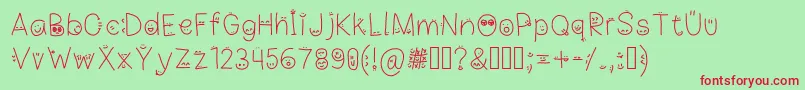 フォントDrawnFacesOnMaLetters – 赤い文字の緑の背景