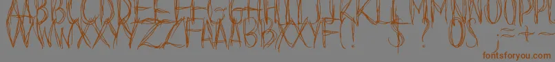 フォントBeforeIFallDemo – 茶色の文字が灰色の背景にあります。