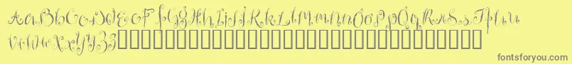 HousemaidAlternate-Schriftart – Graue Schriften auf gelbem Hintergrund