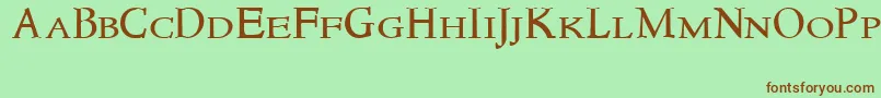 Newstylesmallcaps-fontti – ruskeat fontit vihreällä taustalla