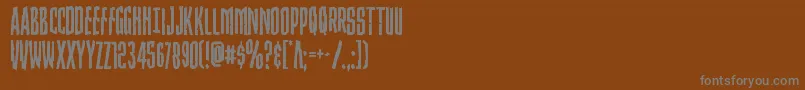 Strangerdanger-Schriftart – Graue Schriften auf braunem Hintergrund