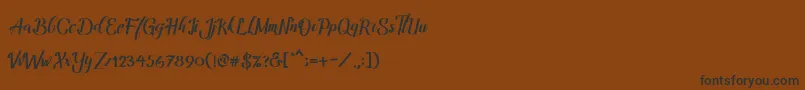 Amandella Font – Black Fonts on Brown Background