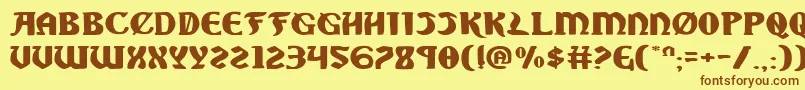 フォントSablee – 茶色の文字が黄色の背景にあります。