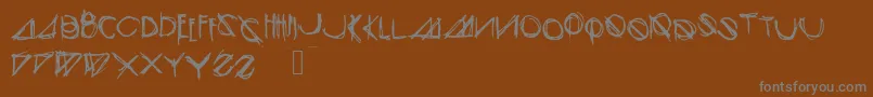Czcionka Modernsketch – szare czcionki na brązowym tle