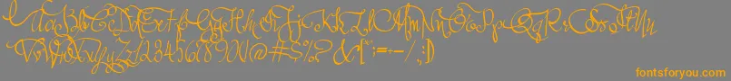 フォントAustieBostAllMyLove – オレンジの文字は灰色の背景にあります。