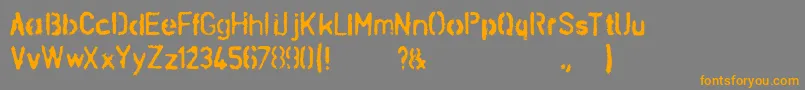 SchablonaDirt Font – Orange Fonts on Gray Background