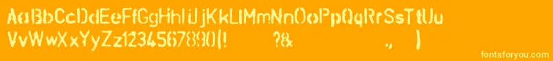 Czcionka SchablonaDirt – żółte czcionki na pomarańczowym tle