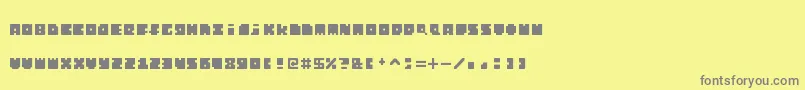 Fonte MonosquareExtended – fontes cinzas em um fundo amarelo