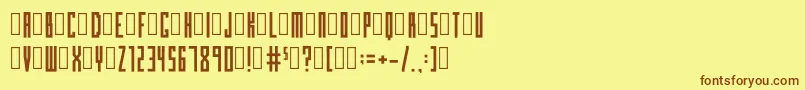 フォントBloxcondensedRegular – 茶色の文字が黄色の背景にあります。