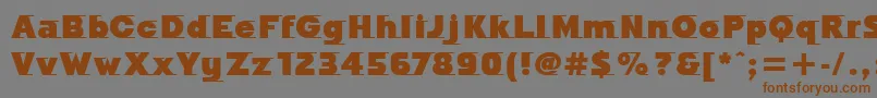 Шрифт OdysseeMdItcTtUltra – коричневые шрифты на сером фоне