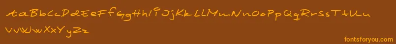 ScribbledMonkey-fontti – oranssit fontit ruskealla taustalla