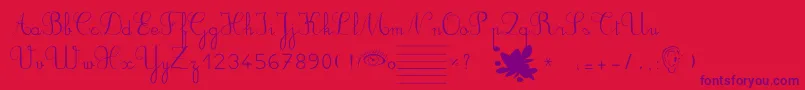 Шрифт Ducahier2CursiveScolaire – фиолетовые шрифты на красном фоне
