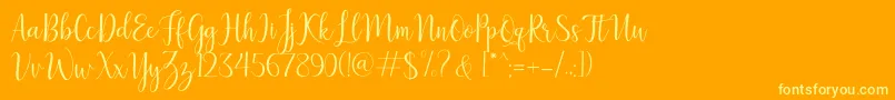 LillymaeRegular-Schriftart – Gelbe Schriften auf orangefarbenem Hintergrund