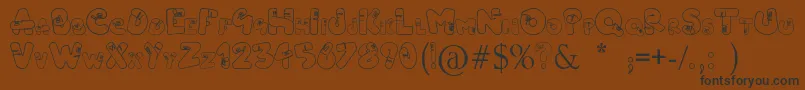 Fonte Vermidirouge1.0 – fontes pretas em um fundo marrom