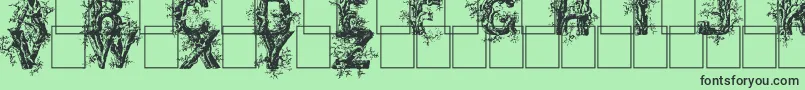 Deepwoodsinitials-Schriftart – Schwarze Schriften auf grünem Hintergrund