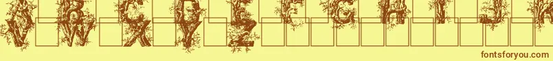 Deepwoodsinitials Font – Brown Fonts on Yellow Background