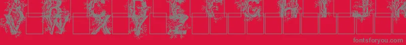 Deepwoodsinitials-Schriftart – Graue Schriften auf rotem Hintergrund