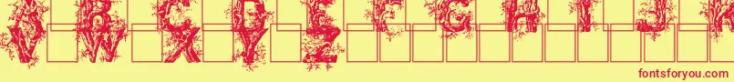 フォントDeepwoodsinitials – 赤い文字の黄色い背景