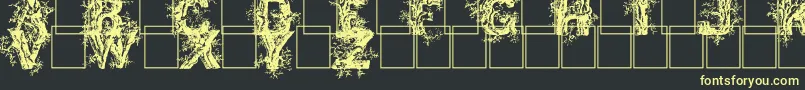 Deepwoodsinitials Font – Yellow Fonts on Black Background