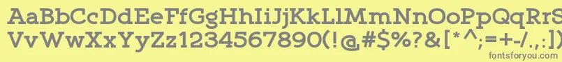 フォントQlarendonBold – 黄色の背景に灰色の文字