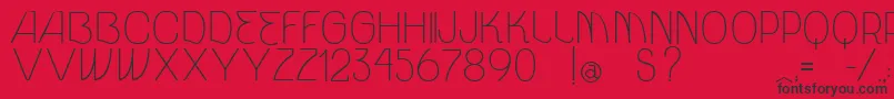 VtksUnidade Font – Black Fonts on Red Background