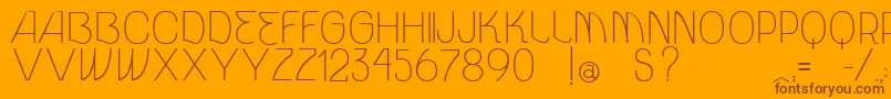 VtksUnidade-Schriftart – Braune Schriften auf orangefarbenem Hintergrund