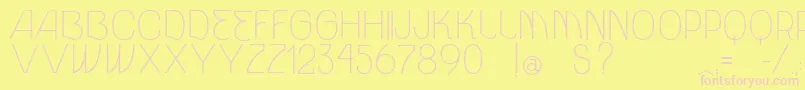 VtksUnidade Font – Pink Fonts on Yellow Background