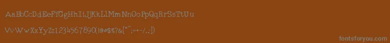 フォントRmTyperighterOld – 茶色の背景に灰色の文字