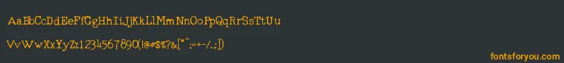 フォントRmTyperighterOld – 黒い背景にオレンジの文字