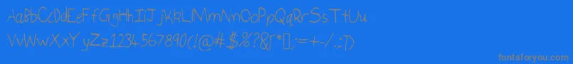 Isukaletters Font – Gray Fonts on Blue Background