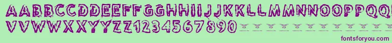 Reasontoseeevil Font – Purple Fonts on Green Background