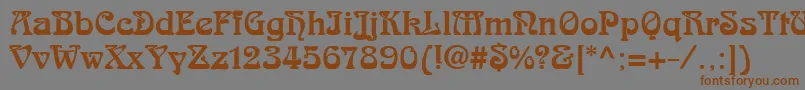 フォントSkazk2 – 茶色の文字が灰色の背景にあります。