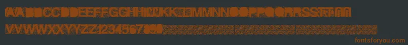 Heckagrunge Font – Brown Fonts on Black Background